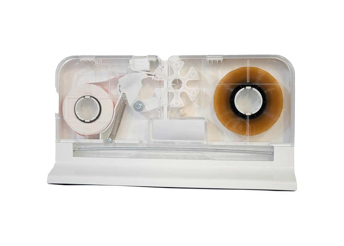 The manual Innoseal sealer with its paper roll and tape roll visible