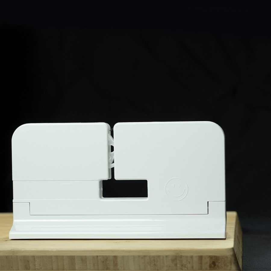 The Classic Sealer in profile on a wooden board, showing the 6 mm slot